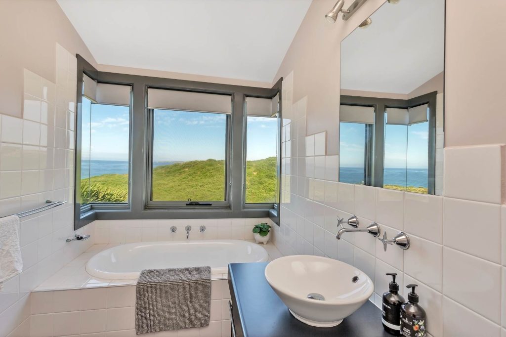 Luxury bathroom overlooking the ocean