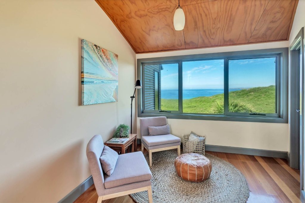 Cozy sitting room with beautiful water views